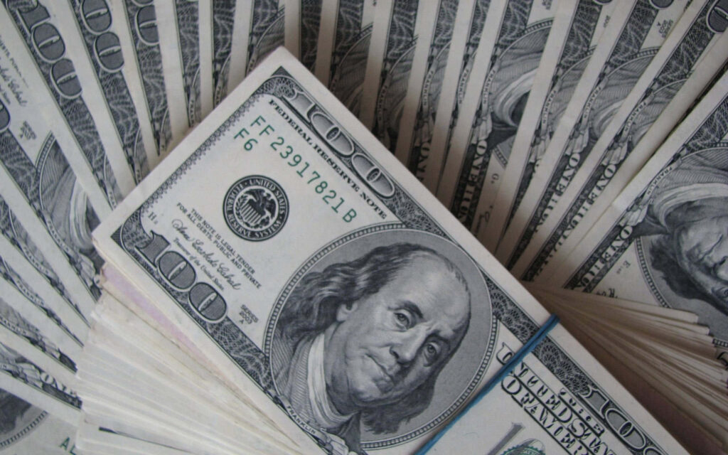 Infinite Wealth: A Mesmerizing 100-Dollar Bill Mosaic for Your Desktop Bliss Wallpaper