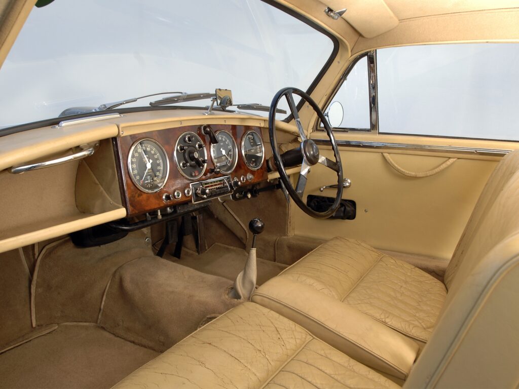Vintage 1950s Aston Martin Interior Wallpaper: Timeless Luxury