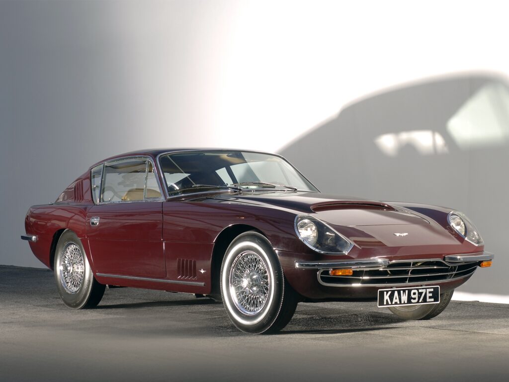 1966 Red Aston Martin Wallpaper: Elegant Vintage Car Styled