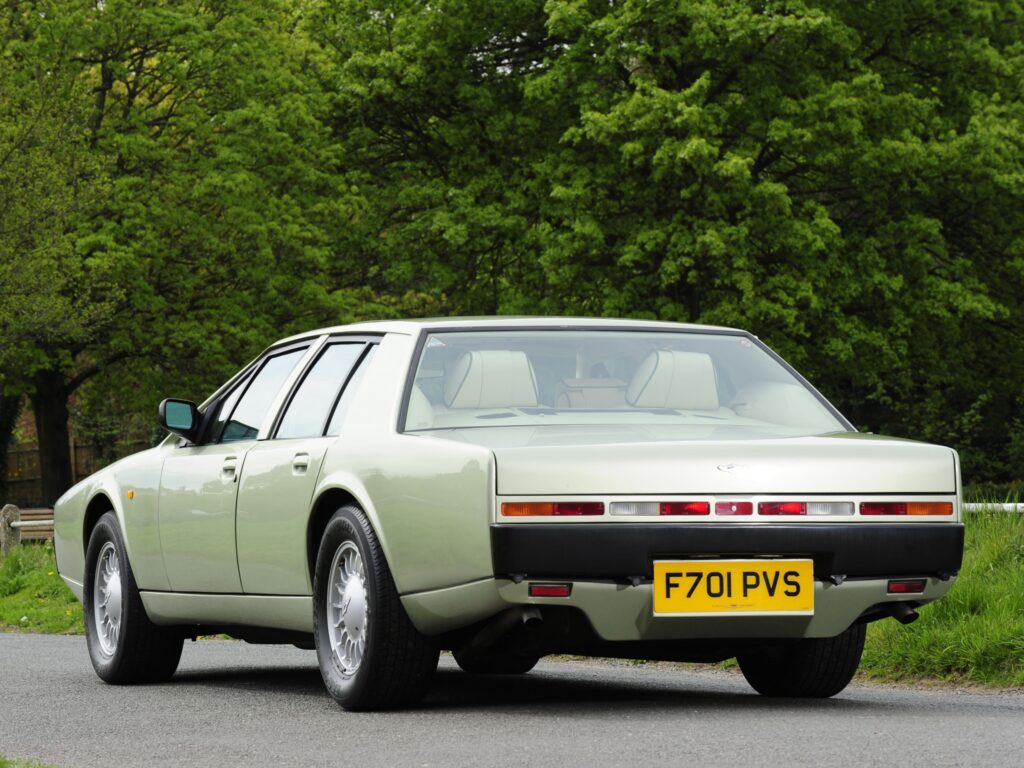 1987 Aston Martin Lagonda in Green - Striking Rear View Wallpaper