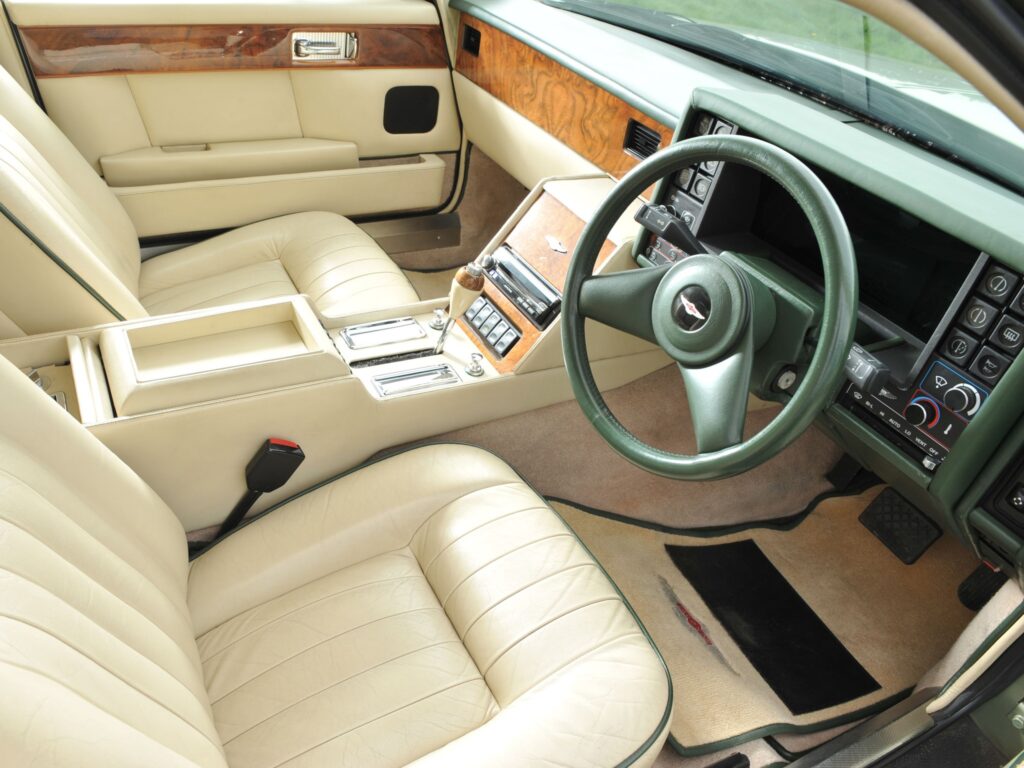 Elegant 1987 Aston Martin Lagonda Interior: Luxurious White Upholstery Wallpaper