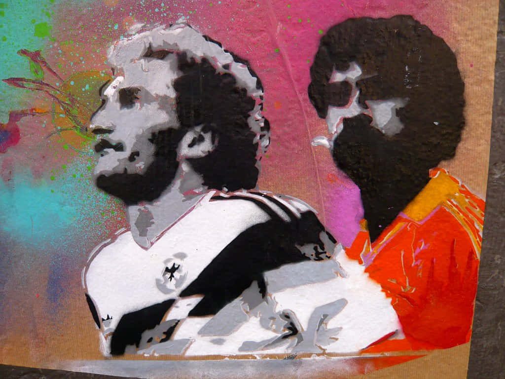 Graffiti art of 1990 World Cup legends Rudi Völler Germany and Frank Rijkaard Netherlands wallpaper