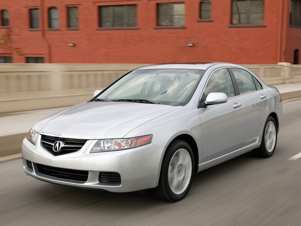 Sleek Silver 2003 Acura TSX Front View Over Bridge - Wallpaper