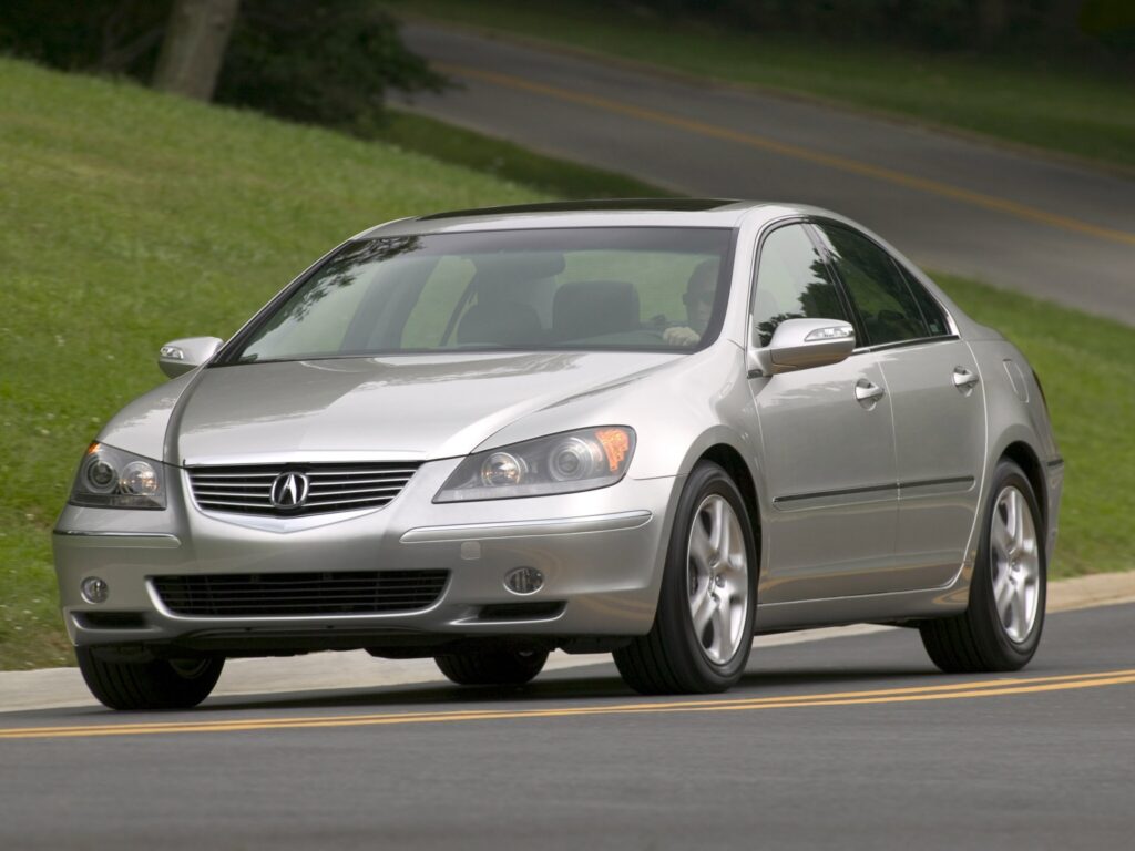 2004 Acura RL in Gray: Sleek Sedan on Scenic Road Wallpaper