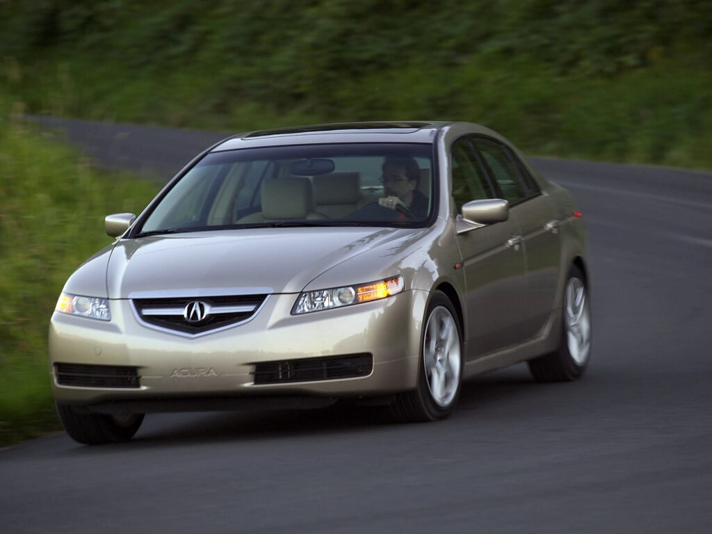 2004 Acura TL in Beige Metallic: Sleek Front View on Asphalt Road Wallpaper