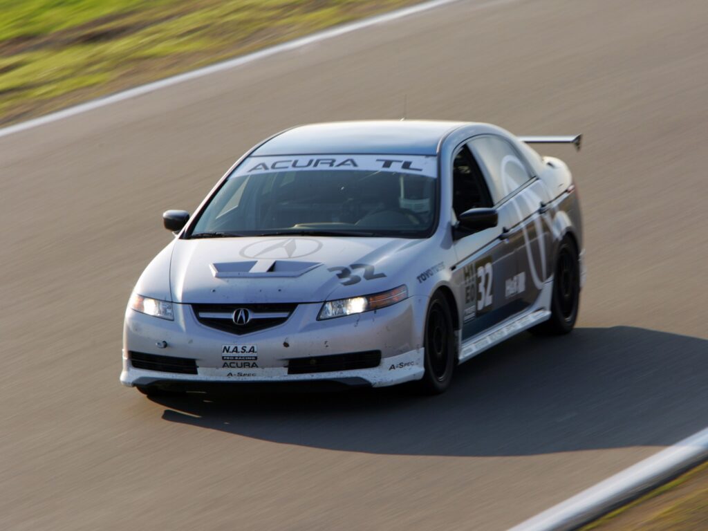 2004 Acura TL Wallpaper: Sleek White Sports Car on Racetrack