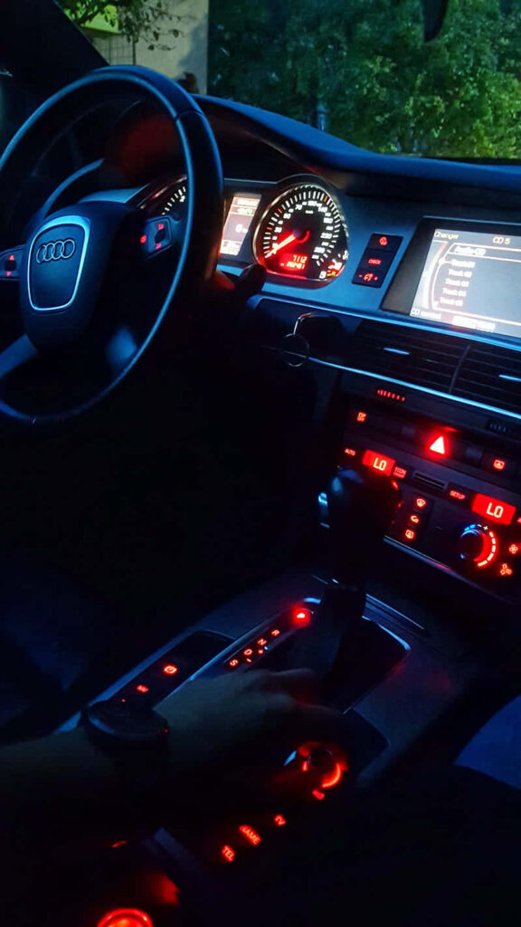 Luxury 2007 Audi A6 interior with illuminated dashboard and advanced premium controls wallpaper