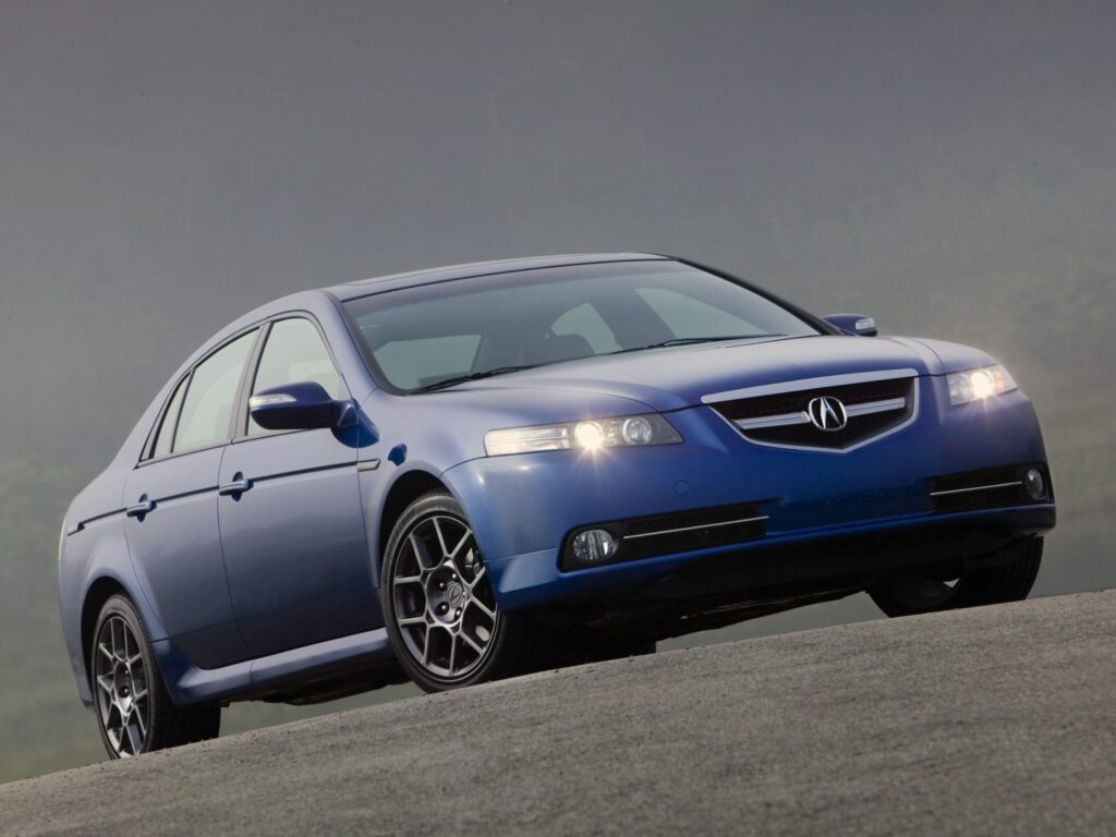2007 Blue Acura TL: Sleek Front View on Smooth Asphalt Background Wallpaper
