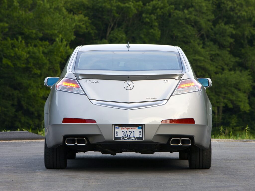 2008 Acura TL Metallic Silver Rear View Wallpaper with Green Trees