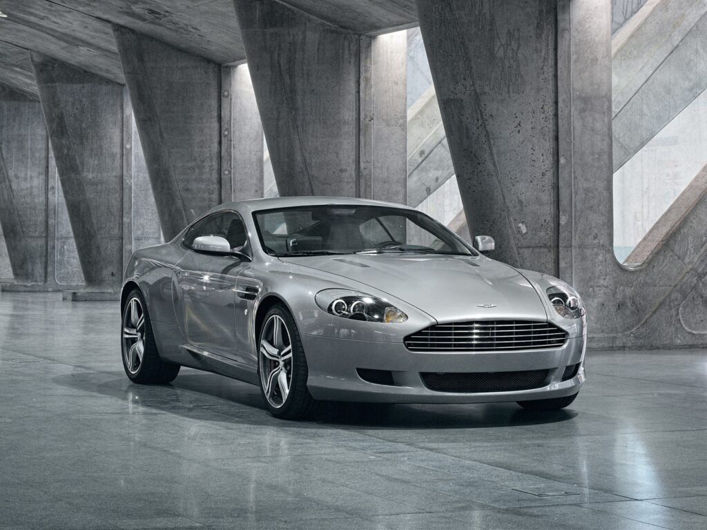 Sleek 2008 Aston Martin DB9 Gray Wallpaper - Luxury Industrial View
