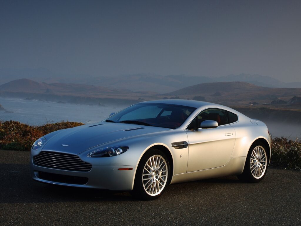 2008 Aston Martin V8 Vantage: Sleek Silver Luxury with Mountain View Wallpaper