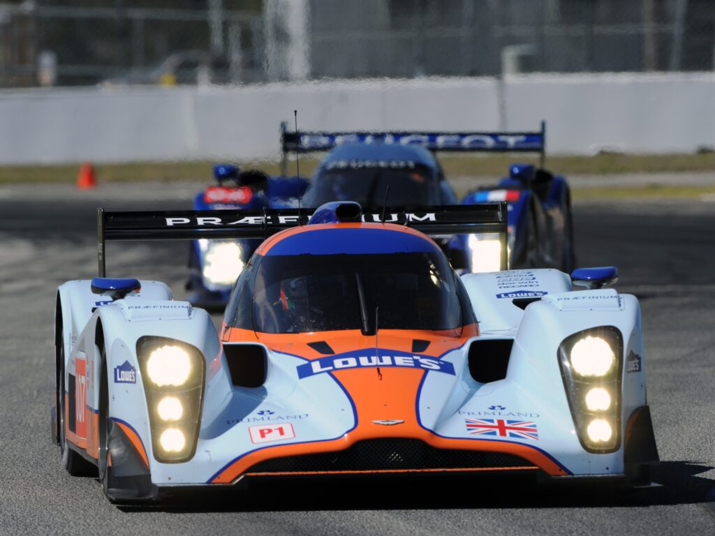 2009 Aston Martin LMP1 Race Car Wallpaper: Sleek Design & Speed