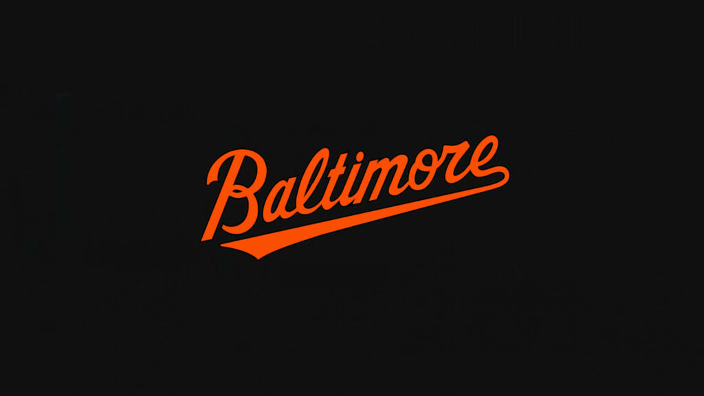 2012 Baltimore Orioles jersey logo with bold orange script on sleek black wallpaper background