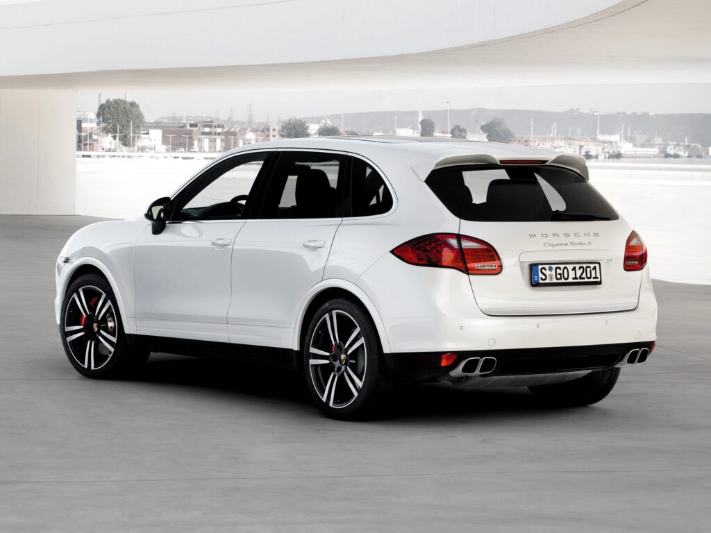 Elegant 2013 Porsche Cayenne Turbo S Wallpaper with Minimalist Background