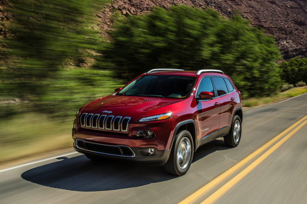 2014 Jeep Cherokee: Adventure on a Scenic Highway Wallpaper
