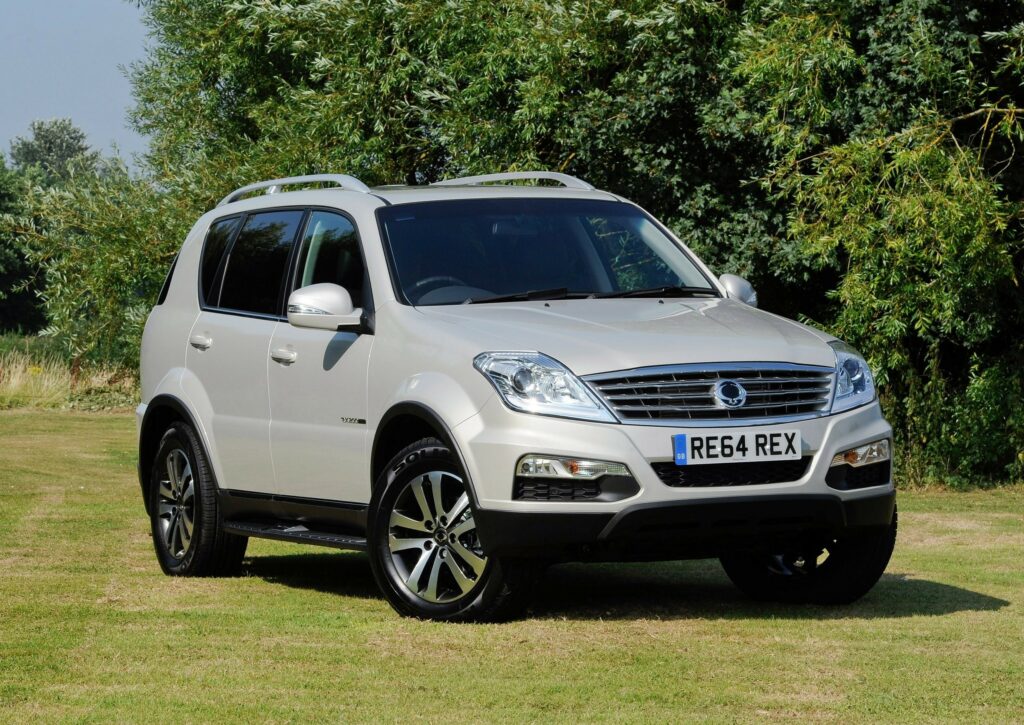 2014 White SsangYong Rexton SUV: Elegant Design in Nature Wallpaper