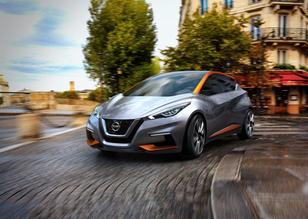 2015 Nissan Sway Concept Car: Sleek Side View Wallpaper in Urban Setting