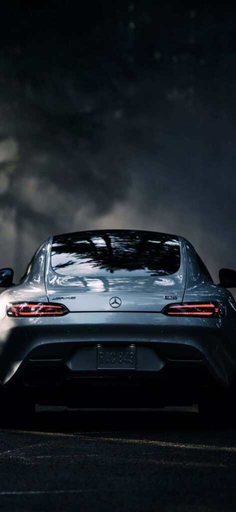 Rear view of 2016 Mercedes-Benz AMG GT S showcasing sleek design and signature taillights Wallpaper