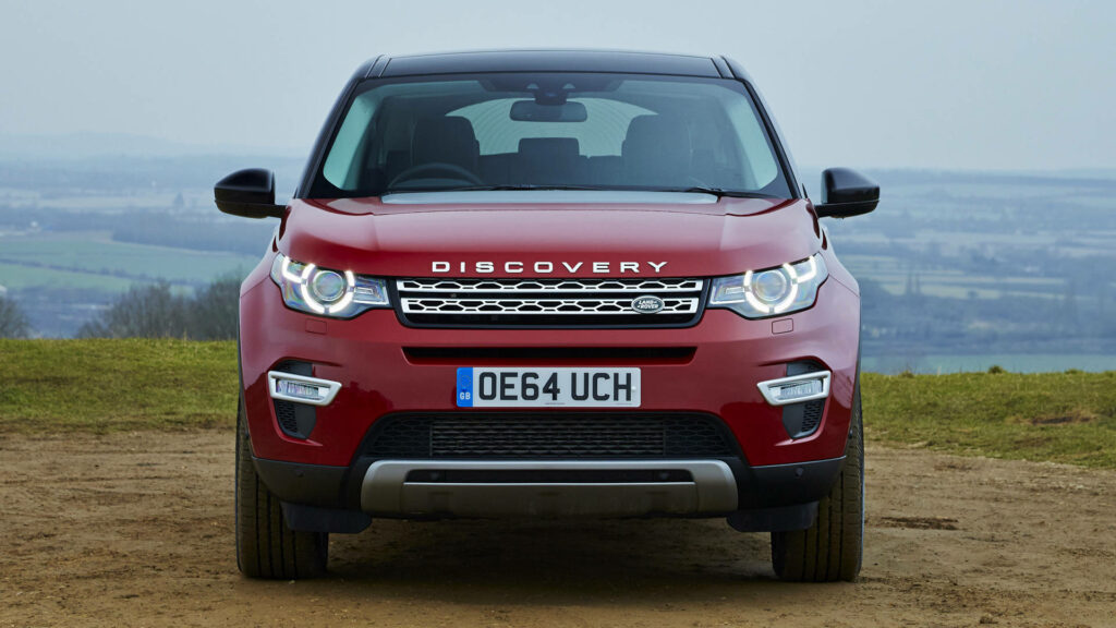 2017 Red Land Rover Discovery Wallpaper: Rugged Elegance in Nature