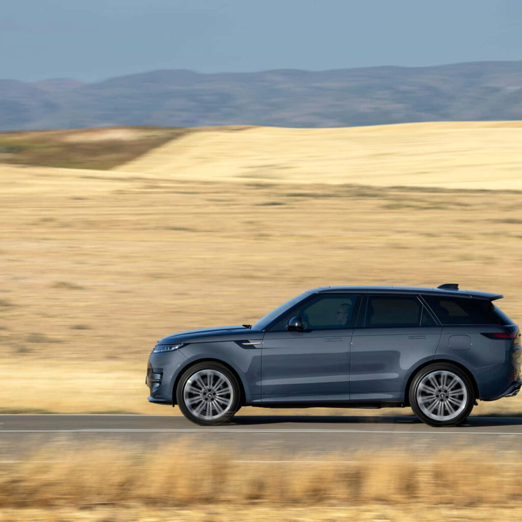 2019 Range Rover Evoque: Elegant Drive in Scenic Country Wallpaper