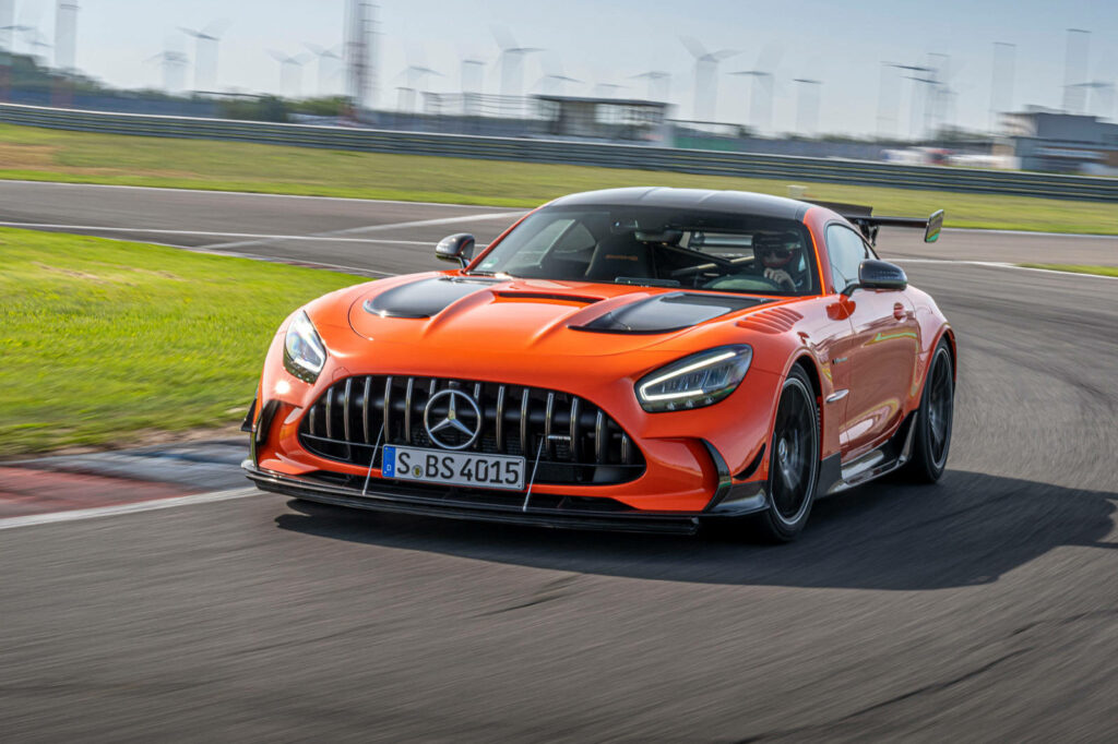 2021 Mercedes AMG GT Black Series racing on track showcasing motorsport design and speed Wallpaper