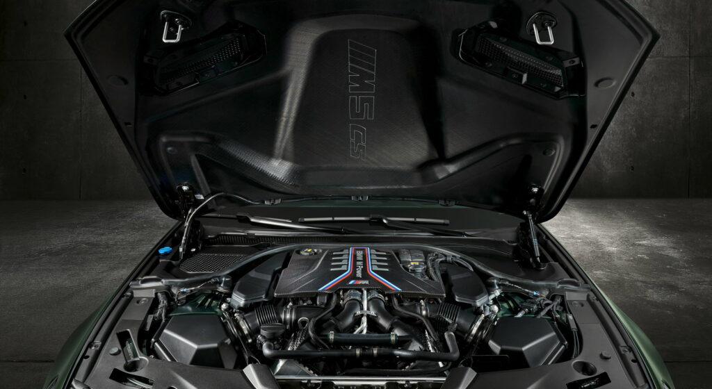 Unleashing Power: The Ferocious Engine of the 2022 BMW M5 CS in an Epic QHD Car Wallpaper