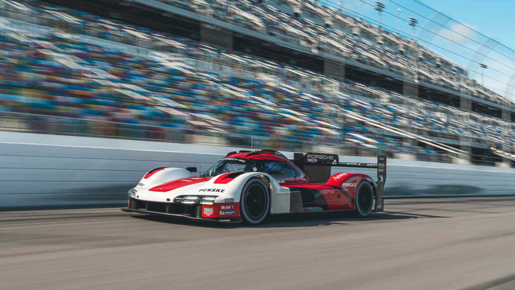 Hypercharged Adrenaline: Unleashing the 2023 Porsche 963 LMDh - A Turbo-Hybrid Marvel of Endurance Racing Wallpaper