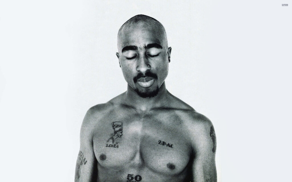 The Enigmatic Icon: 2Pac's Shirtless Reverie in Grayscale Splendor Wallpaper