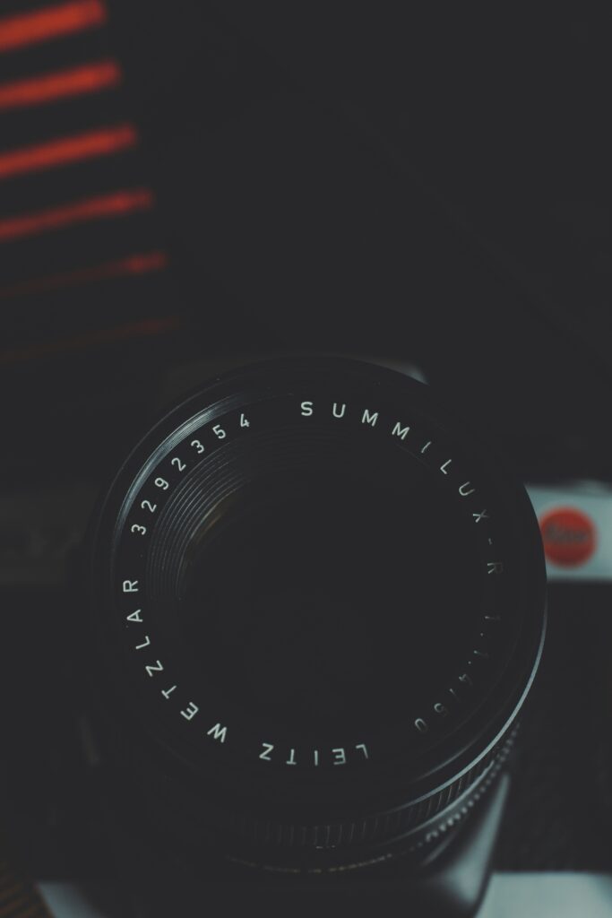 Close-Up Camera Lens Wallpaper: High-Res 3840x5760 Dark Background