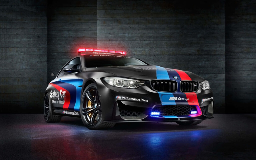 Revved up: A sleek 3D BMW sports car illuminated by vibrant blue and red lights Wallpaper