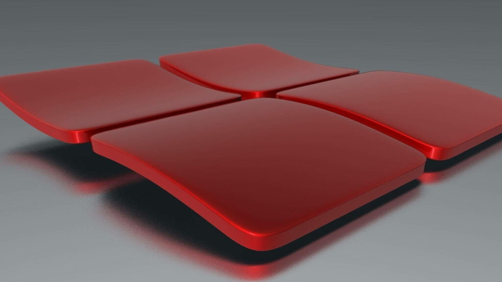 Enthralling Windows 11: Mesmerizing 3D Logo Suspended above Gleaming Metallic Landscape Wallpaper