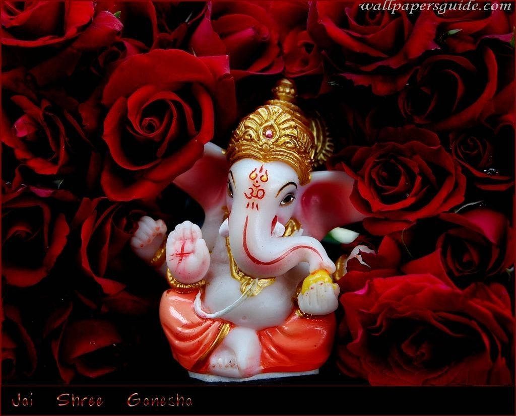 3D Lord Ganesha figurine with golden crown on red roses devotional wallpaper background