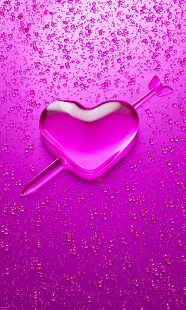 Striking 3D Metallic Pink Heart Wallpaper with Textured Backdrop