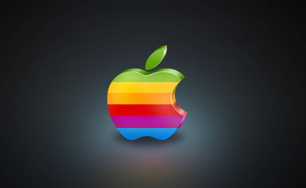 3D Apple logo wallpaper retro rainbow stripes glowing on dark gray background for MacBook desktop