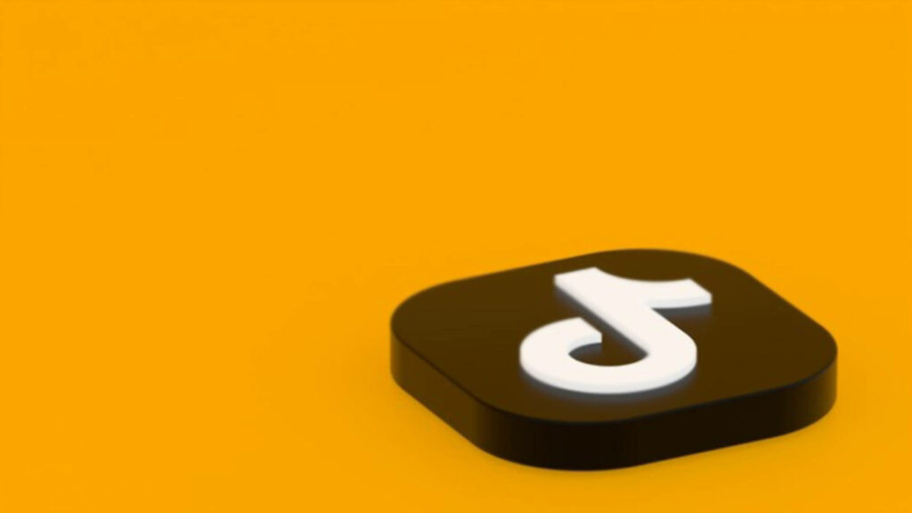 3D TikTok logo on vibrant yellow background modern bold wallpaper for TikTok fans