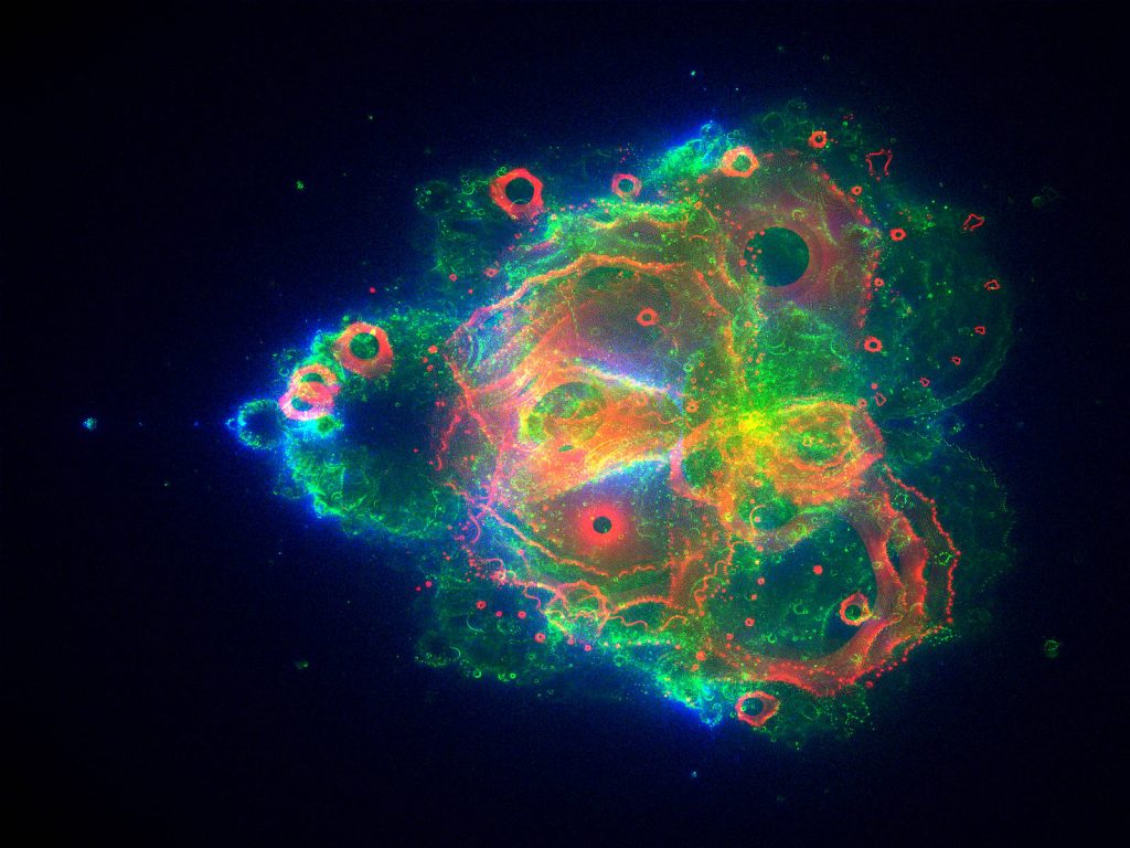 4D glowing abstract fractal wallpaper with neon green blue and red on dark cosmic background