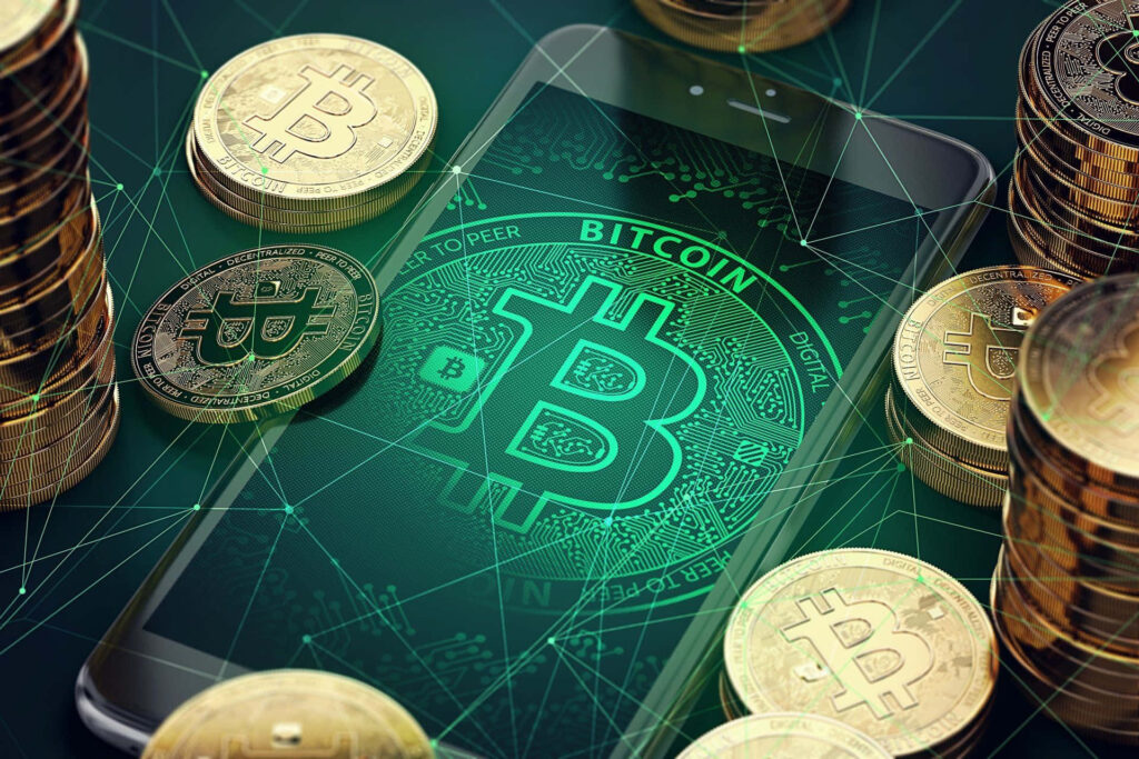4k desktop wallpaper of smartphone with Bitcoin logo and gold bitcoins digital network background