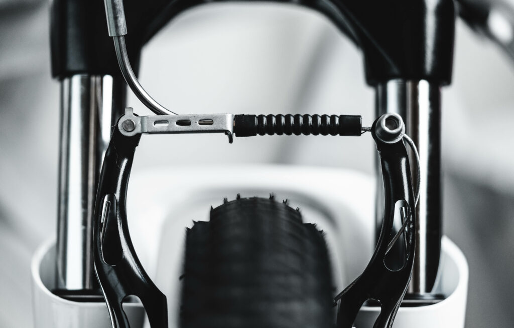 4K Wallpaper: Close-Up of Precision Bicycle Brakes & Tire Design
