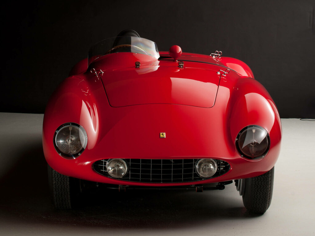 Ferrari's Exquisite 750 Monza: A Captivating Red Racing Beast in Stunning 4k Detail Wallpaper
