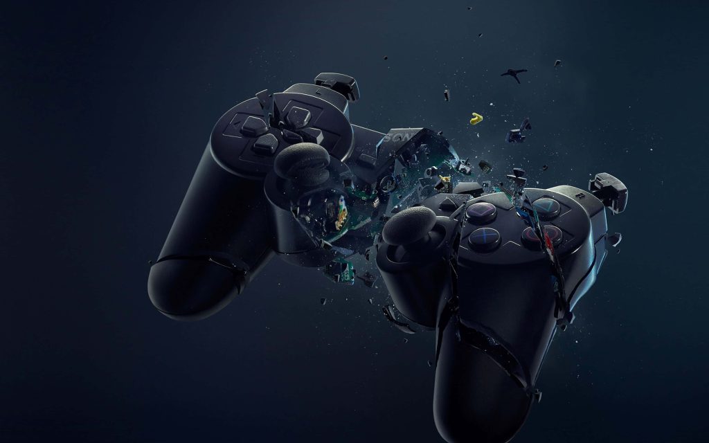 4K gaming wallpaper of shattered PlayStation 2 controller revealing intricate circuitry on dark background