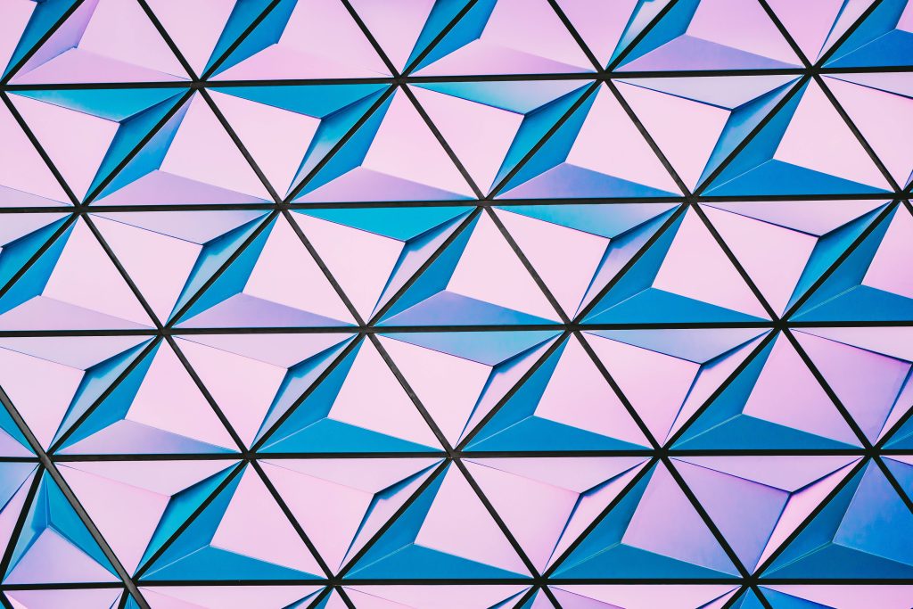 4K geometric wallpaper with blue and lavender triangular panels inspired by Epcot Spaceship Earth