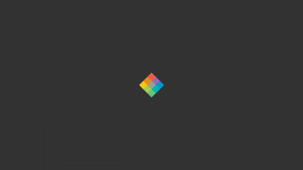 4K Minimalist Wallpaper: Multicolored Cube on Dark Background