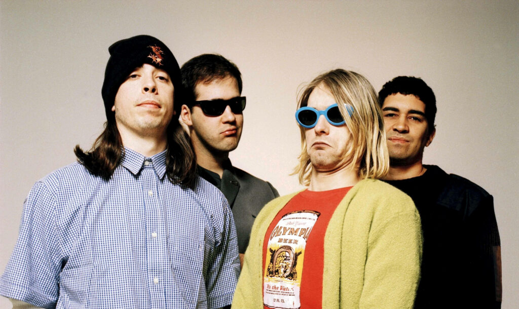 Nirvana 4K Group Photo Wallpaper: Iconic Band Spirit in Expressive Pose