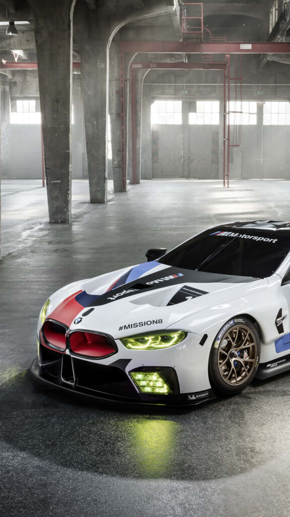 4K Resolution: Stunning White BMW M8 Model Car Graces Your Mobile Wallpaper