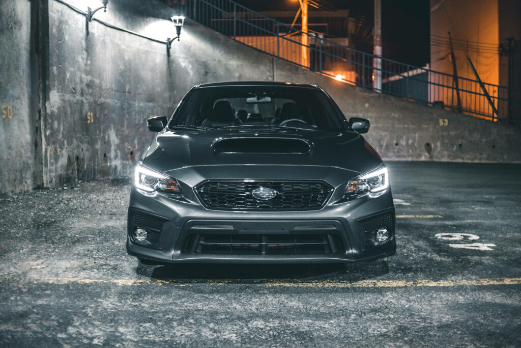 Stunning 4K Subaru WRX STI Wallpaper: Aggressive Design at Night