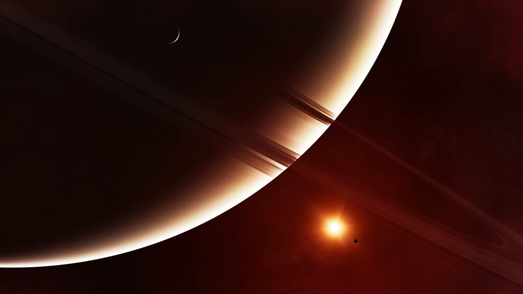 Stunning 4K Saturn Wallpaper: Iconic Rings & Reddish Cosmic Glow