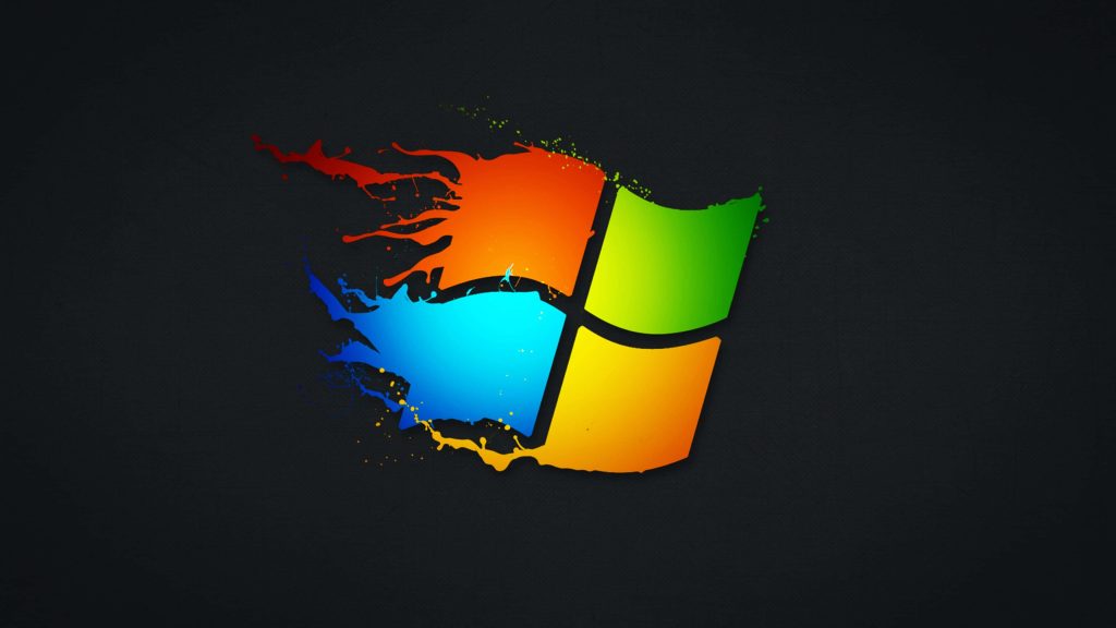 4K Windows logo wallpaper with vibrant paint splash on dark textured background desktop art