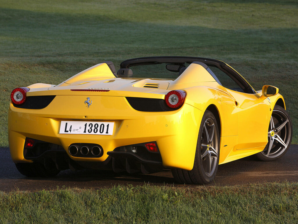 Stunning 4k Snapshot of a Radiant Yellow Spider Ferrari 2013, Back-Dropped by Serene Fields Wallpaper