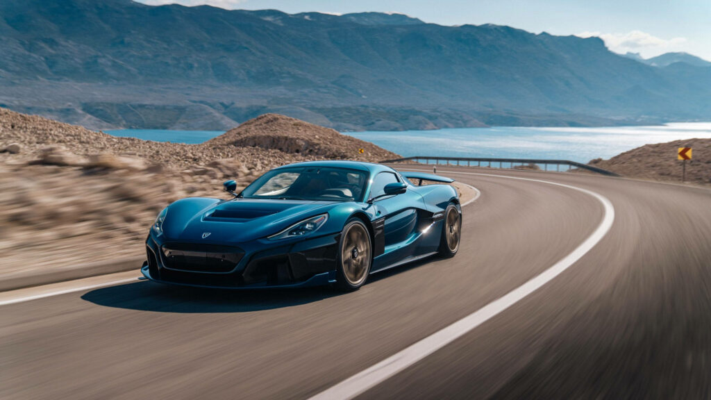 Zooming Ahead: Capturing the Thrill of a High-Speed Blue Car on the Road - Mesmerizing 4k Car Background Wallpaper