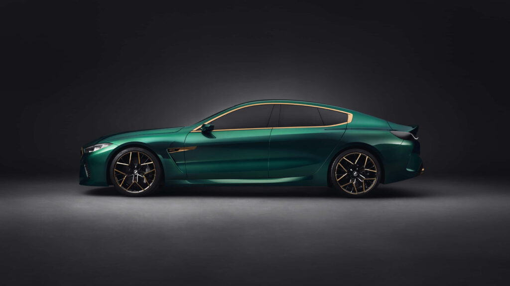 Dashing in Darkness: A Stunning 4K Wallpaper Showcasing a Dark-Green BMW M8 Model Car